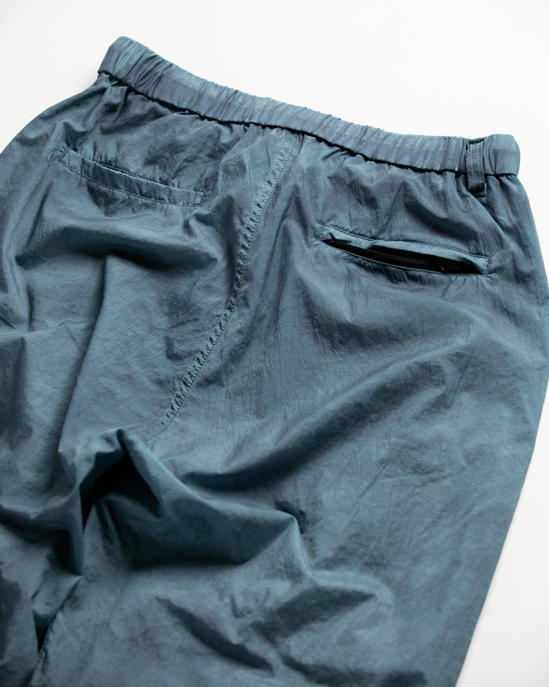 AN344 UTILITY NYLON TUCK EASY PANTS